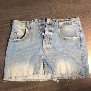 Super cute light wash jean skirt! Barely worn